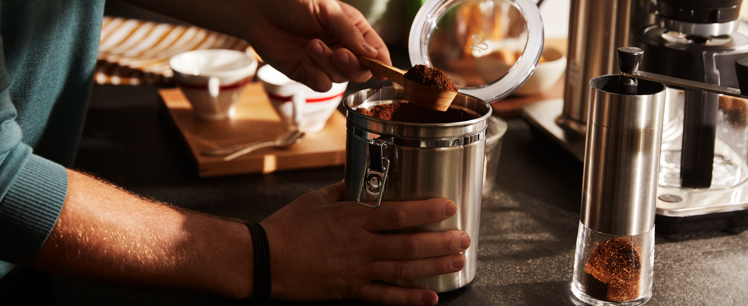 Кавомолка Tchibo ручна, керамічний жорно, регульований помел, срібна