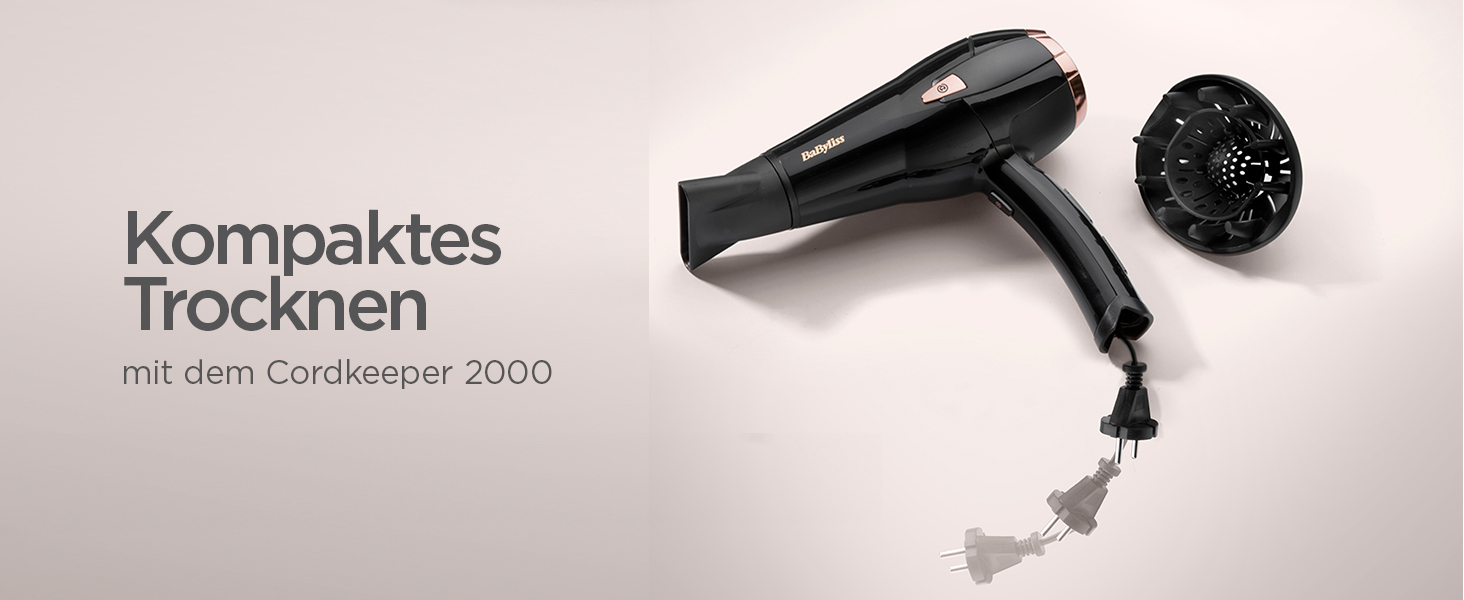 Іонний фен BaByliss Cordkeeper 2000 D373E, унікальна функція втягування кабелю У ручці, 2000 Вт чорний