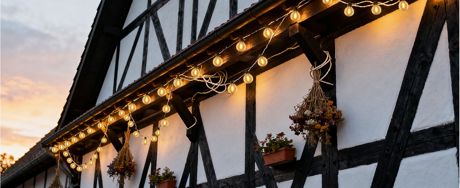 Льо́нточна гiрля́нда для зовнiшнього використання 30м, 50+2 лампочки G40, тепле бiле свiтло, IP45, для терас, вечiрiнок, саду та балкону, стиль Едiсона, з'єднувальна, чорний колір