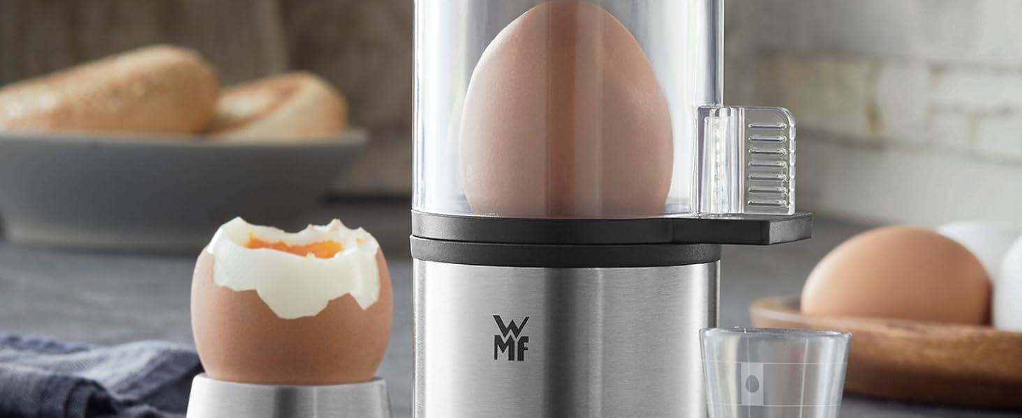 Електричний яйцеварник WMF Stelio, нержавіюча сталь, 1-7 яєць, 380 Вт, регулювання ступенів нагріву, функція підтримання тепла, мірний стакан з викруткою для яєць