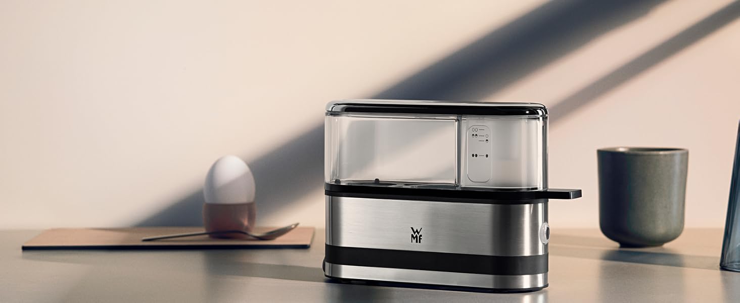Електричний яйцеварка WMF Stelio з нержавіючої сталі, для 1-7 яєць, 380 Вт, регулювання ступеня готовності, функція підтримання тепла, мірний стаканчик з підставкою для яєць
